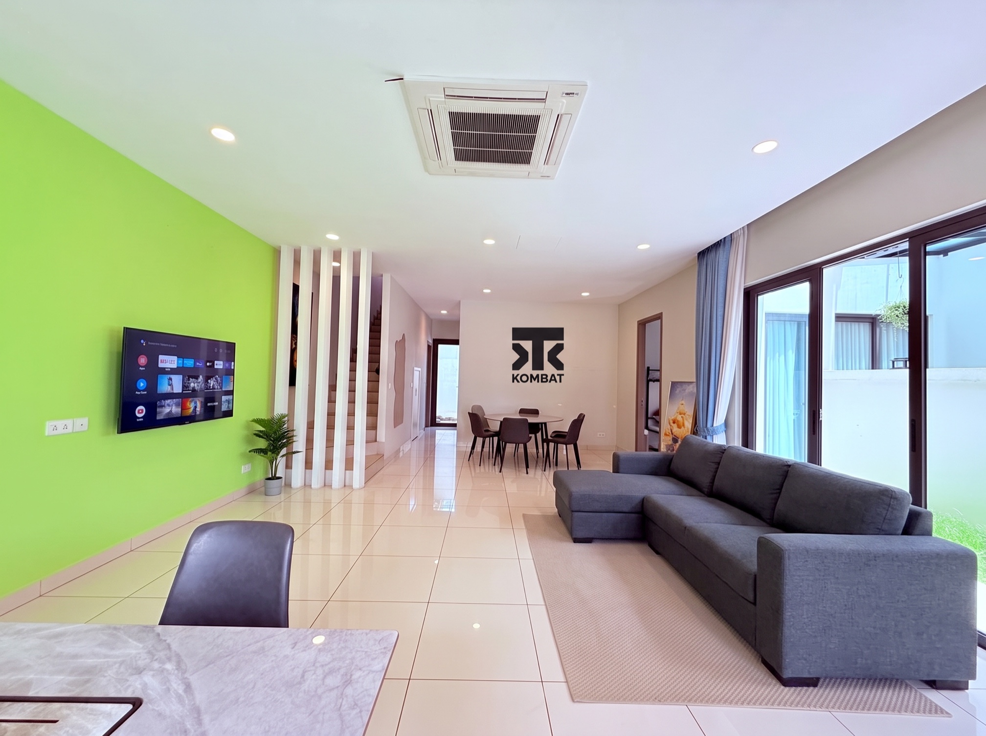 The living area, where the house gathers between sessions